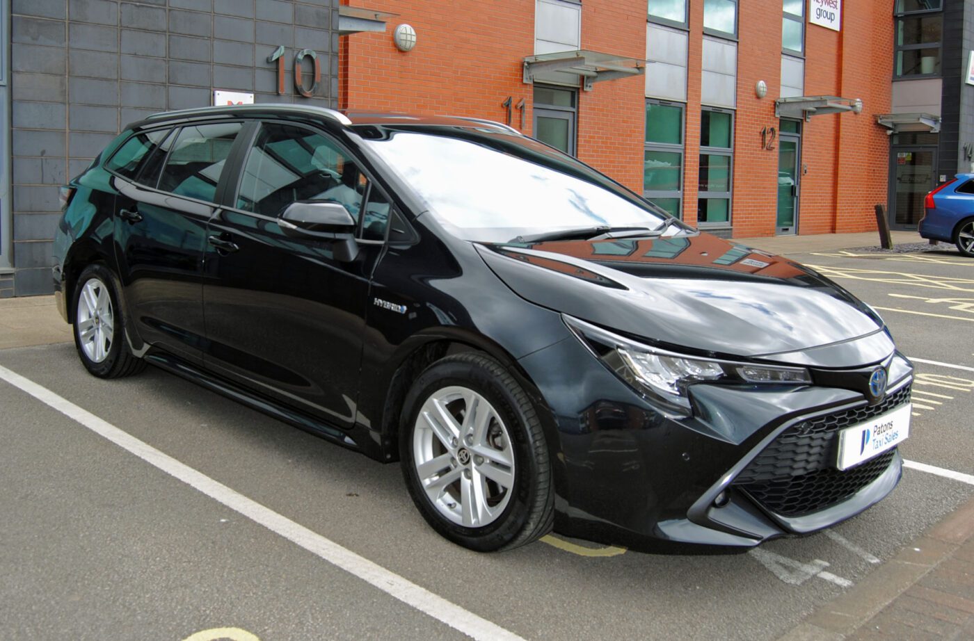 Black Toyota Corolla front right side view