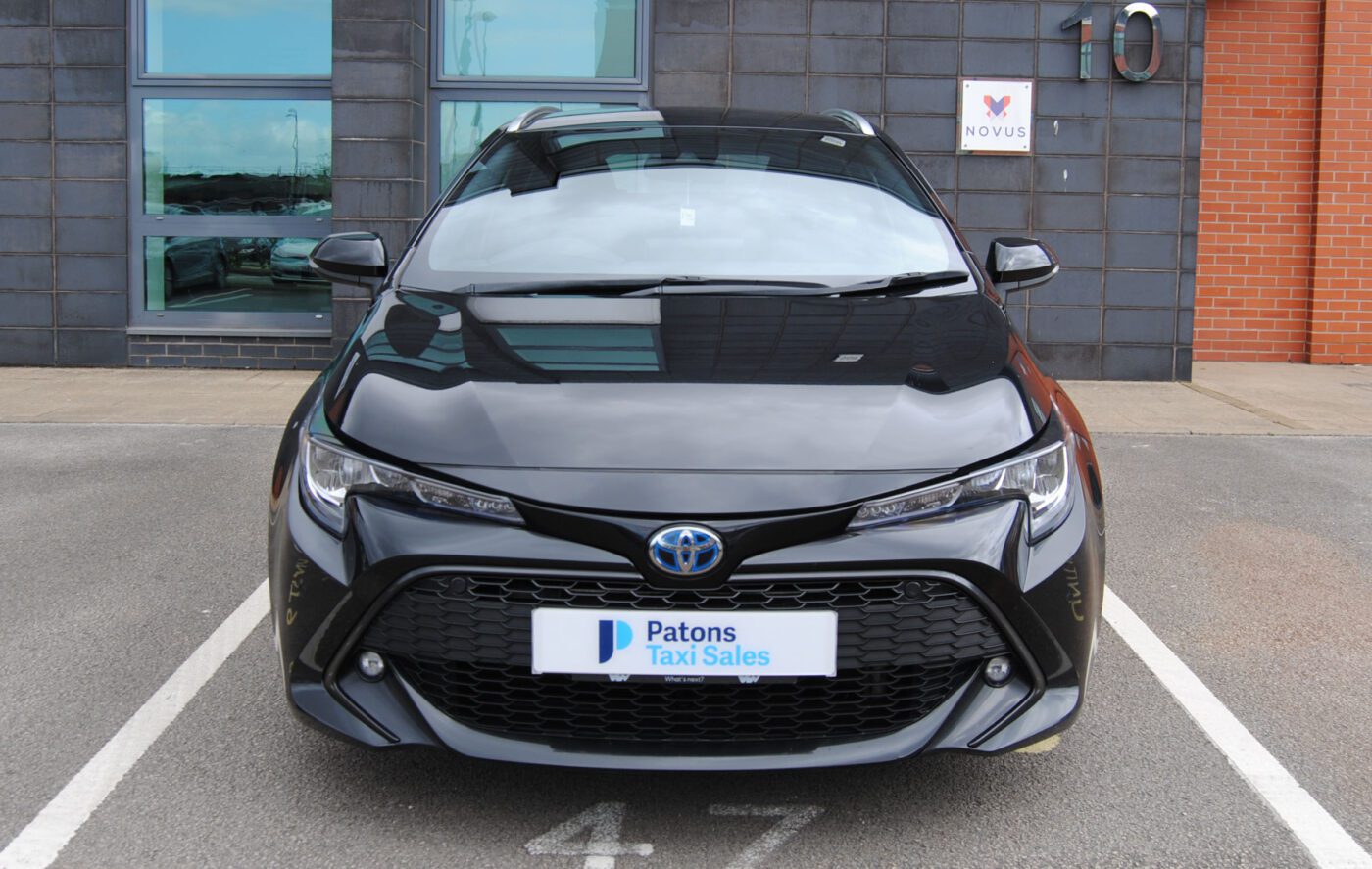 Black Toyota Corolla front view