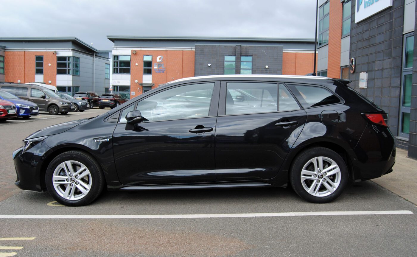 Black Toyota Corolla left side view