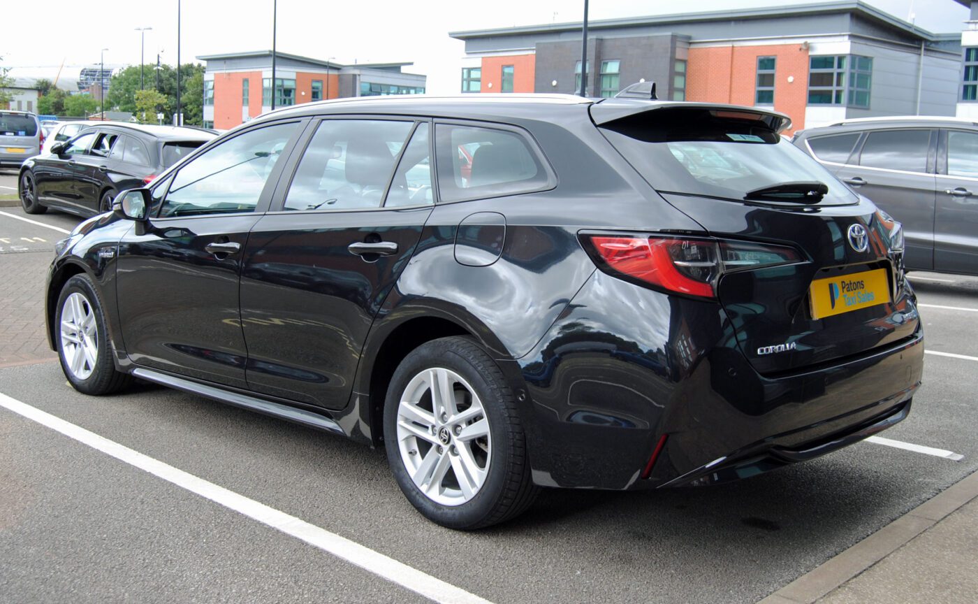 Black Toyota Corolla back left side view