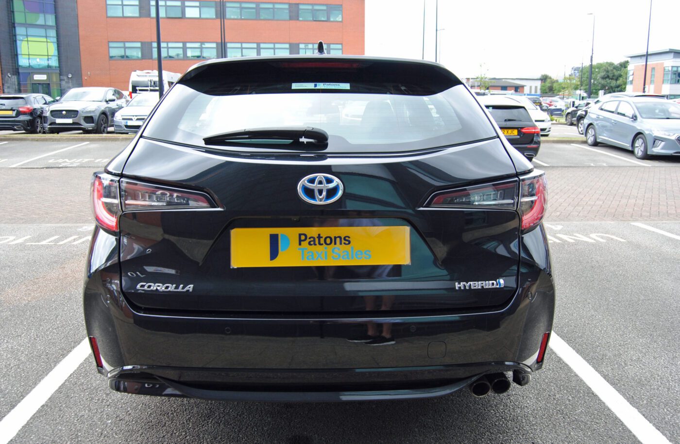 Black Toyota Corolla back view