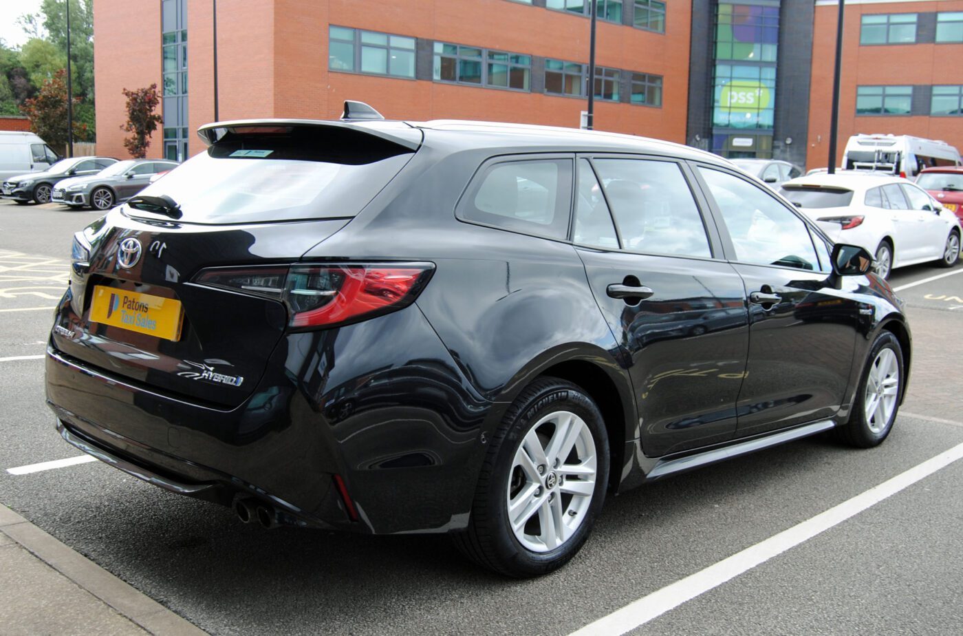 Black Toyota Corolla back right-side view