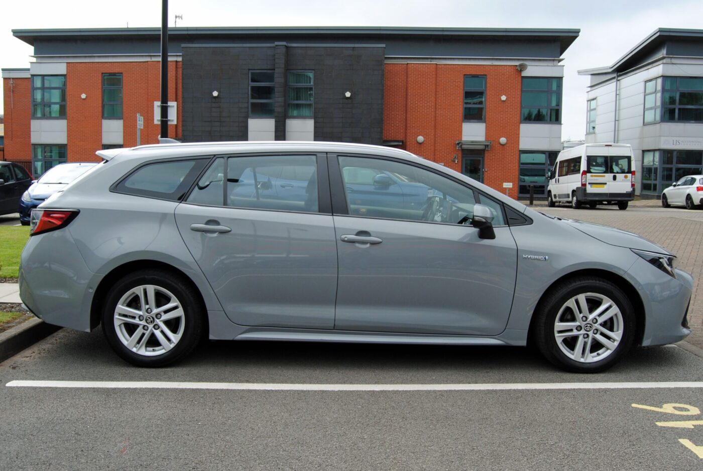 Right side view of a grey Toyota Corolla