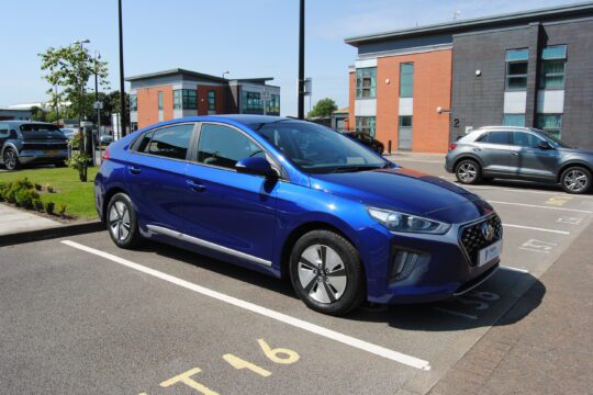 Front right side view of a blue Hyundai Ioniq SE Connect