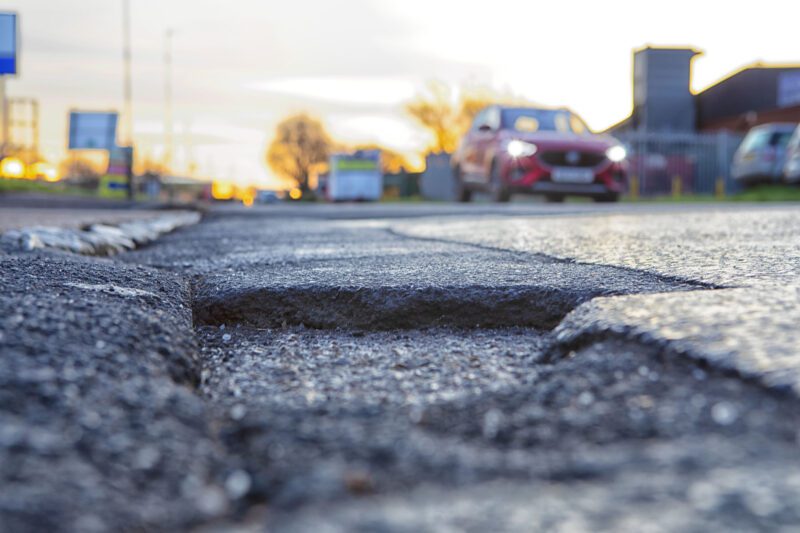 Potholes in road